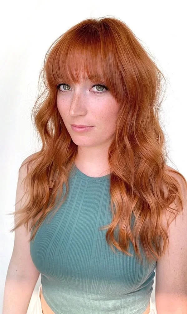 10 Fiery Chestnut Hair Color Ideas 8 Wavy Long Chestnut Hair With Bangs