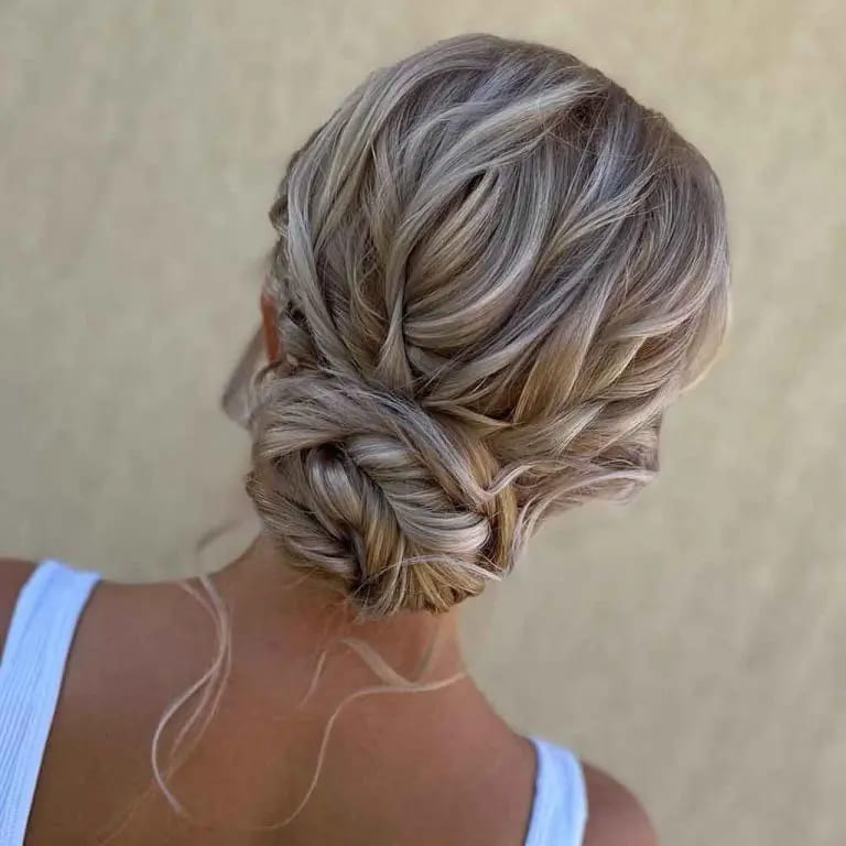 10 Elegant Hairstyles for Wavy Hair for women 2 Wedding Style Wavy Bun on Blonde Hair