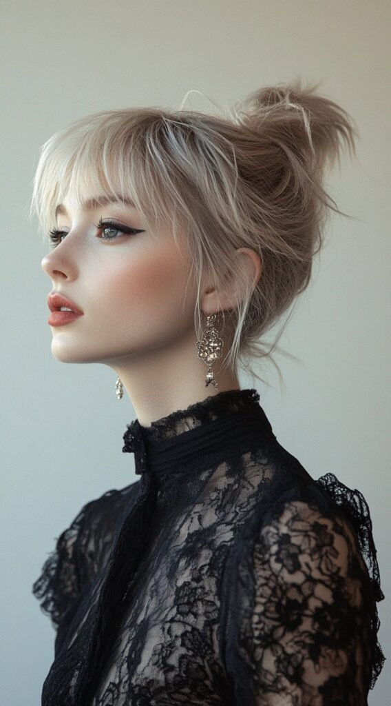 23 New Year’s Hairstyles for Short Hair 23 messy top knot with wispy bangs