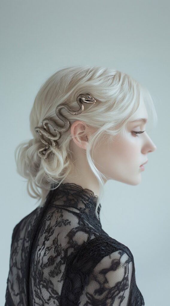 17 Medusa Hair Ideas 15 soft blonde low bun with silver serpent
