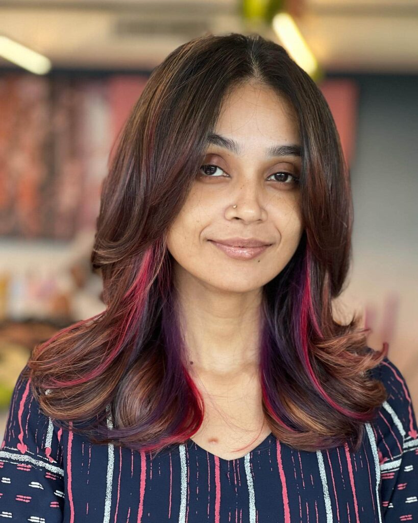 17 Peekaboo Highlights for Dark Hair Ideas 16 subtle burgundy and purple highlights