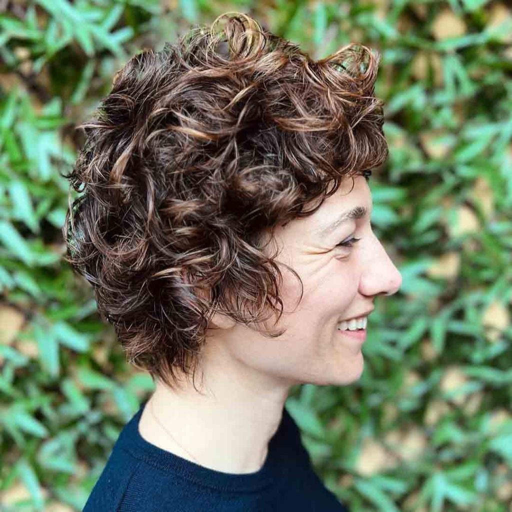 20 Classy Short Wolf Cut Ideas to Turn Heads! 10 Curly Short Wolf Cut With Highlights