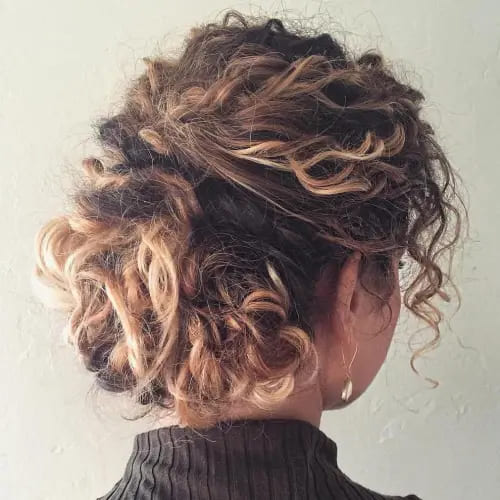 10 Latest Hairstyles for Naturally Curly Hair 1 1. Elegant Updo for Natural Curly Hair 1
