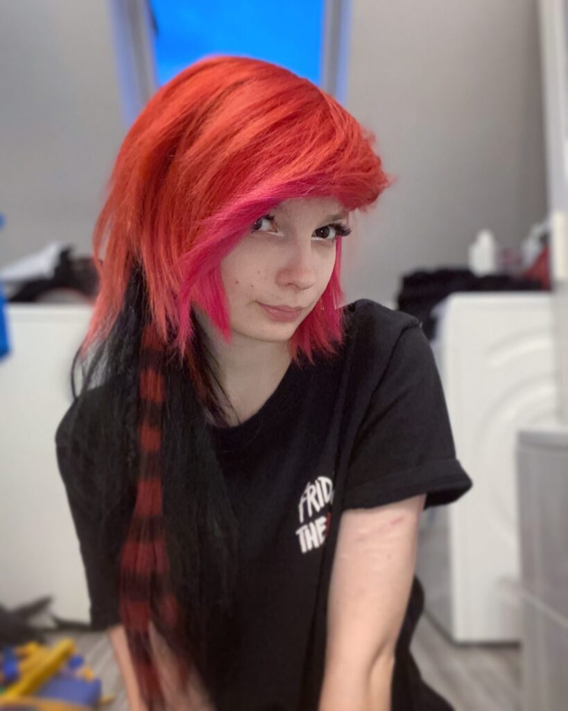 12 Emo Scene Hairstyles for a Throwback 1 1. Half Red Half Black Emo Style Hair