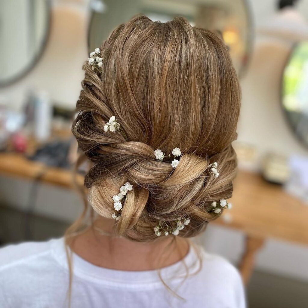 12 Stunning Hairstyles for Bridesmaids 1 1. Tucked in Twisted Braided bun 1