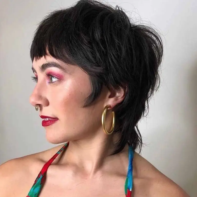 10 Classy Shaggy Wolf Cuts With Bangs 10 10. Black Shag Mullet Pixie Wolf Cut With Bangs 1