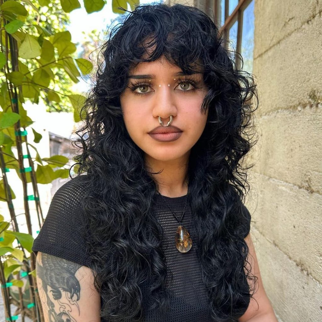 30 Best Curly Wolf Cut Ideas to Showcase Your Beautiful Curls 12 Long Mullet Wolf Cut on Curly Hair