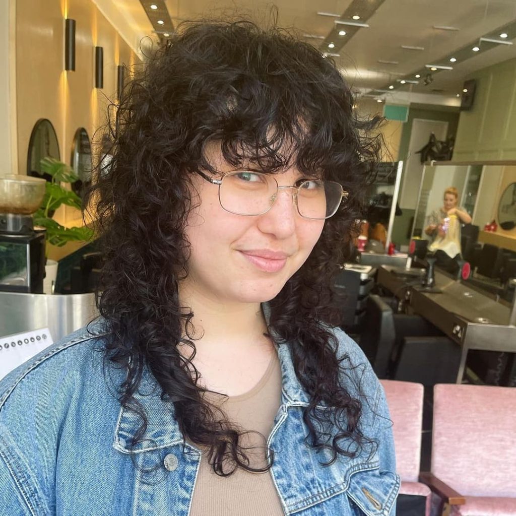 30 Best Curly Wolf Cut Ideas to Showcase Your Beautiful Curls 14 Shag Mullet Wolf Cut on Long Curly Hair