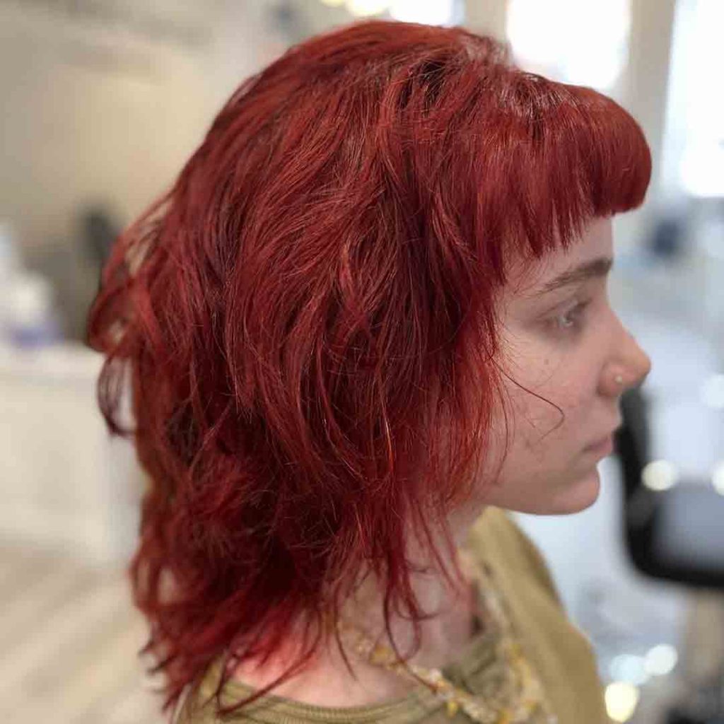 20 Classy Short Wolf Cut Ideas to Turn Heads! 17 Short Wolf Cut on Red French Bob With Bangs