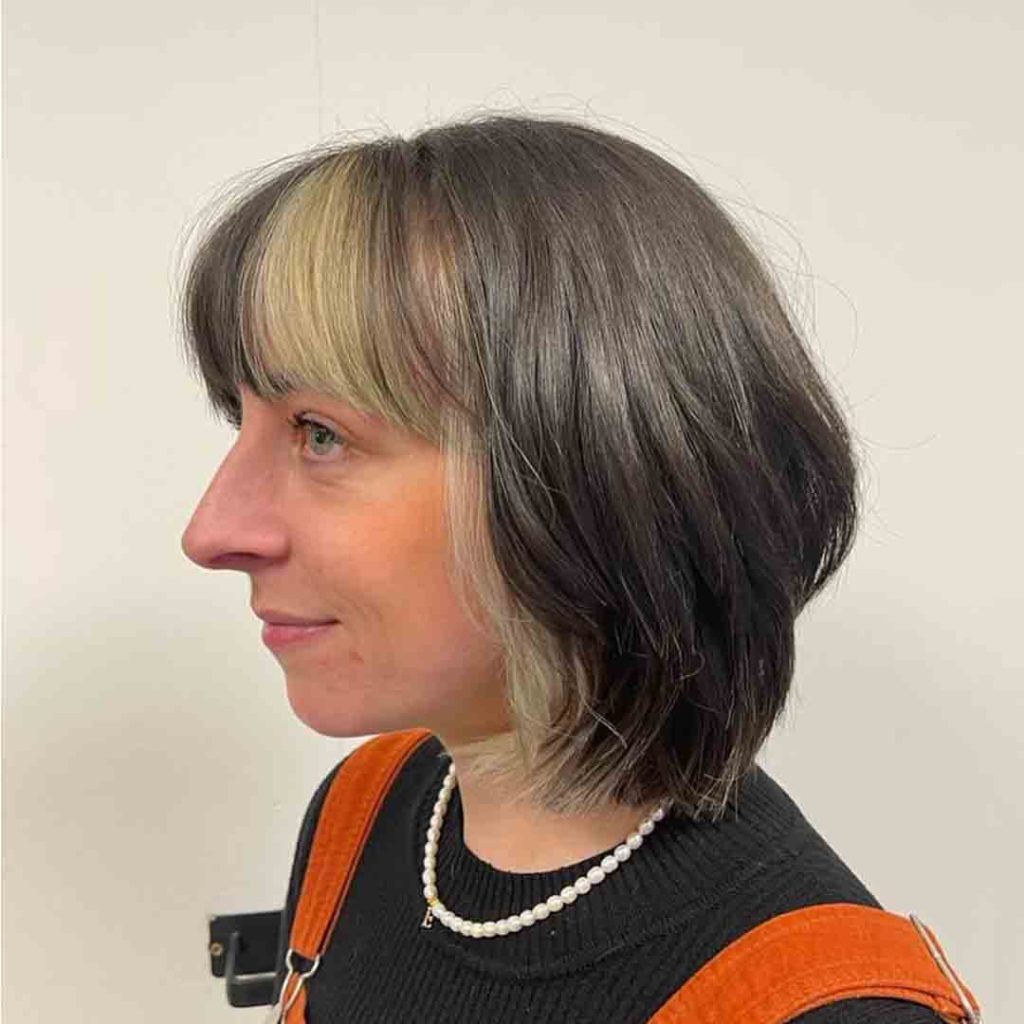 20 Classy Short Wolf Cut Ideas to Turn Heads! 18 Short Wolf Cut With Blonde Skunk Stripes