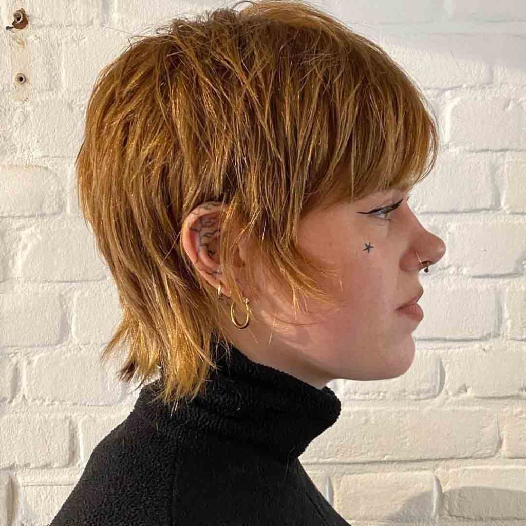 20 Classy Short Wolf Cut Ideas to Turn Heads! 19 Pixie Wolf Cut on Golden-Brown Hair