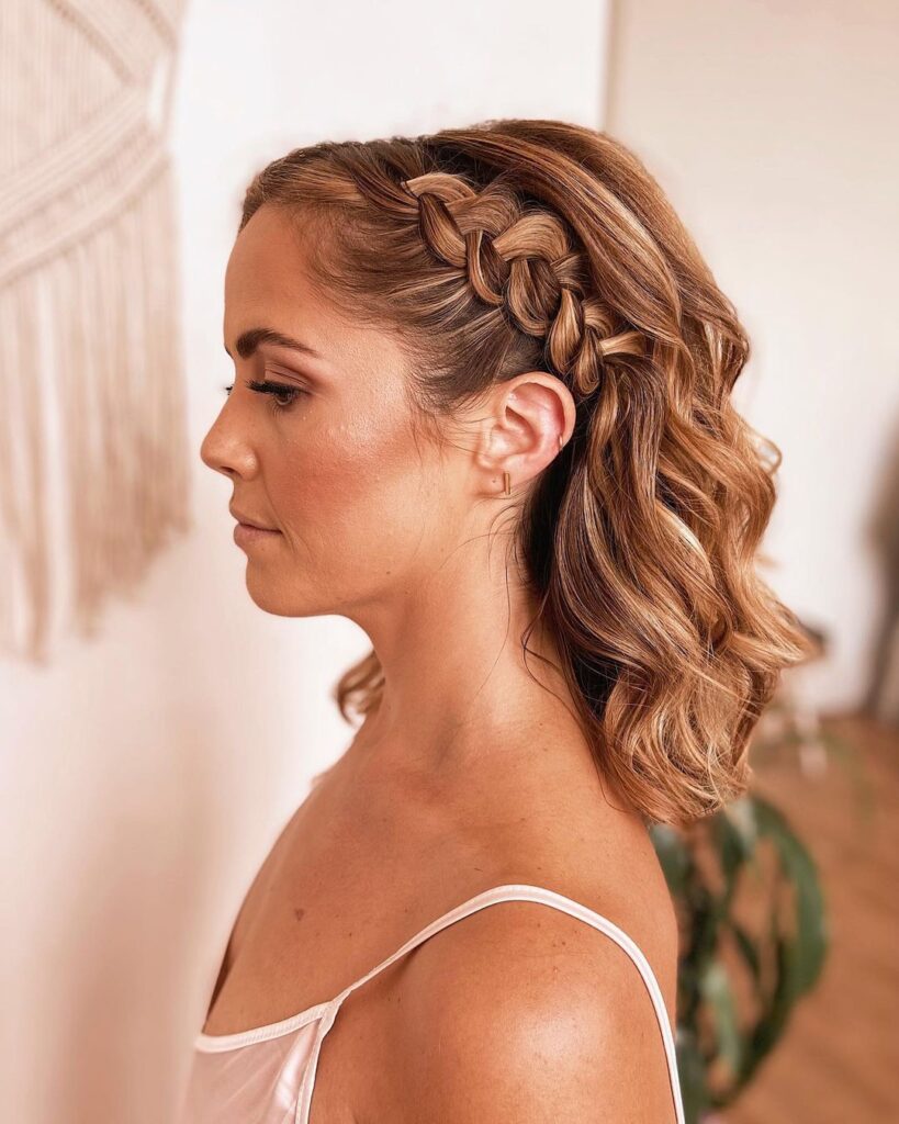 12 Stunning Hairstyles for Bridesmaids 2 2. Medium Wavy Hair With Pull Through Side Braid Tucked Behind the Ear