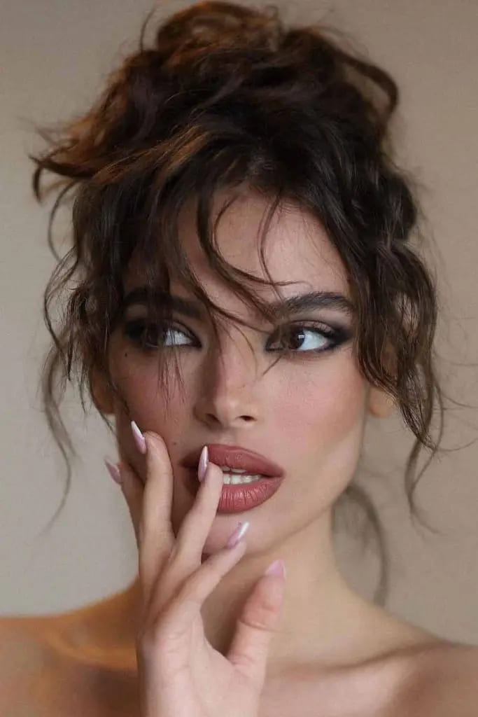 12 Hairstyles for Any and Every Hair Type 2 2. Messy Updo With Loose Waves