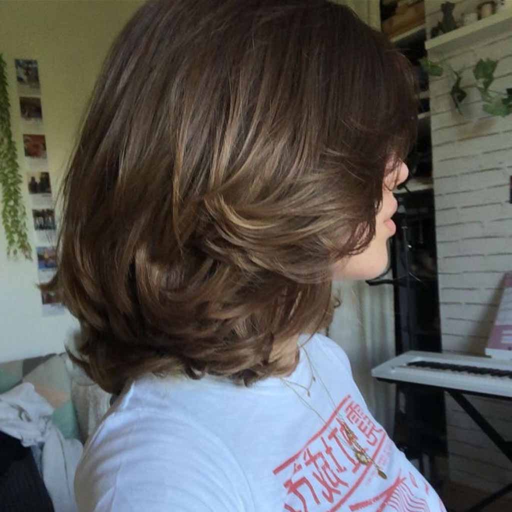 20 Best Fluffy Wolf Cut Ideas for Your Signature Style! 8 Layered Wavy Bob Wolf Cut