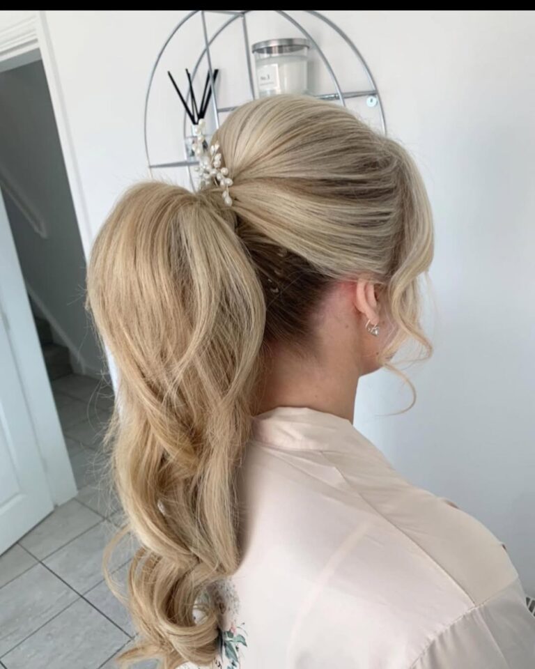 12 Stunning Hairstyles for Bridesmaids 3 3. Pin Up Wavy Ponytail 1