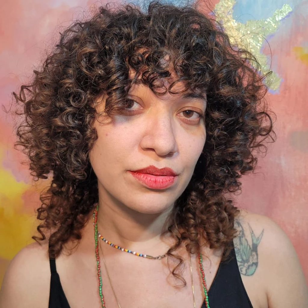 30 Best Curly Wolf Cut Ideas to Showcase Your Beautiful Curls 5 Simple and Classy Curly Wolf Cut