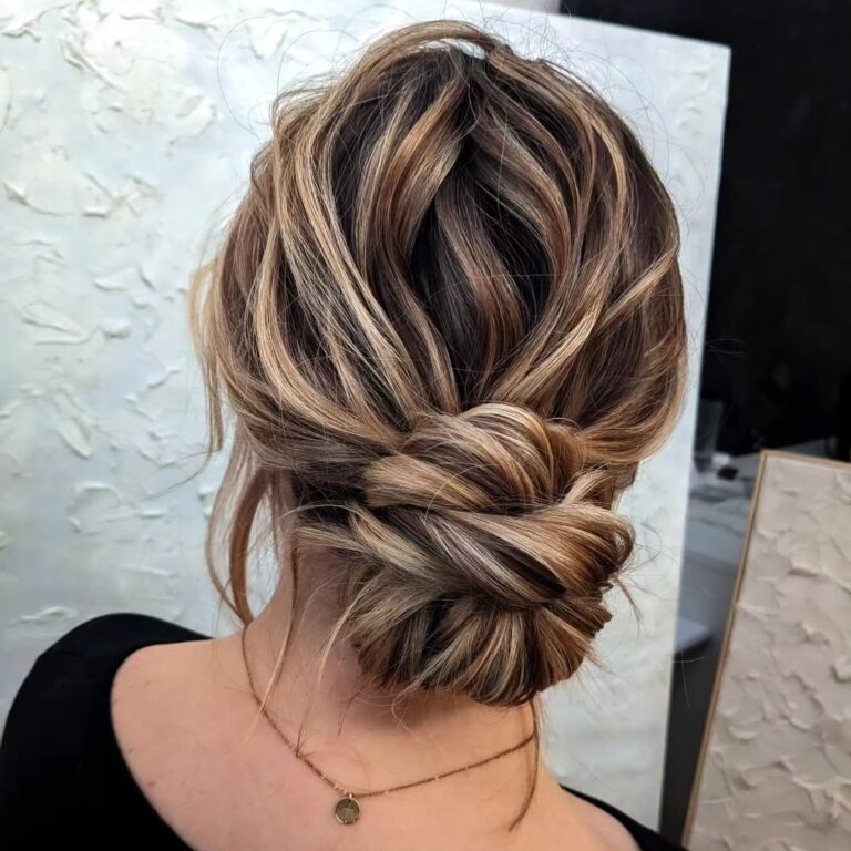 12 Stunning Hairstyles for Bridesmaids 6 6. Wavy Messy Twisted Low Bun 1