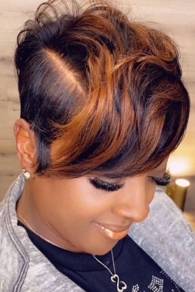 10 Chic Pixie Cuts For Black Women 7 7. Chopped Mob Pixie Cut With Brown Highlights 1