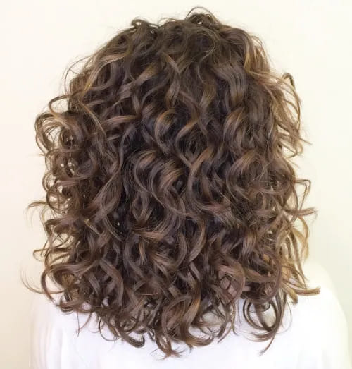 10 Latest Hairstyles for Naturally Curly Hair 8 8. Gorgeous Medium Curly Bouncy Hairstyle 1