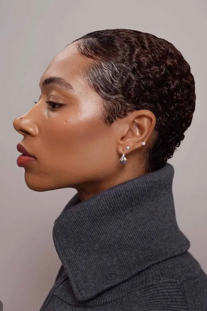 10 Chic Pixie Cuts For Black Women 8 8. Slicked Back Short Curls With Pixie Cut 1