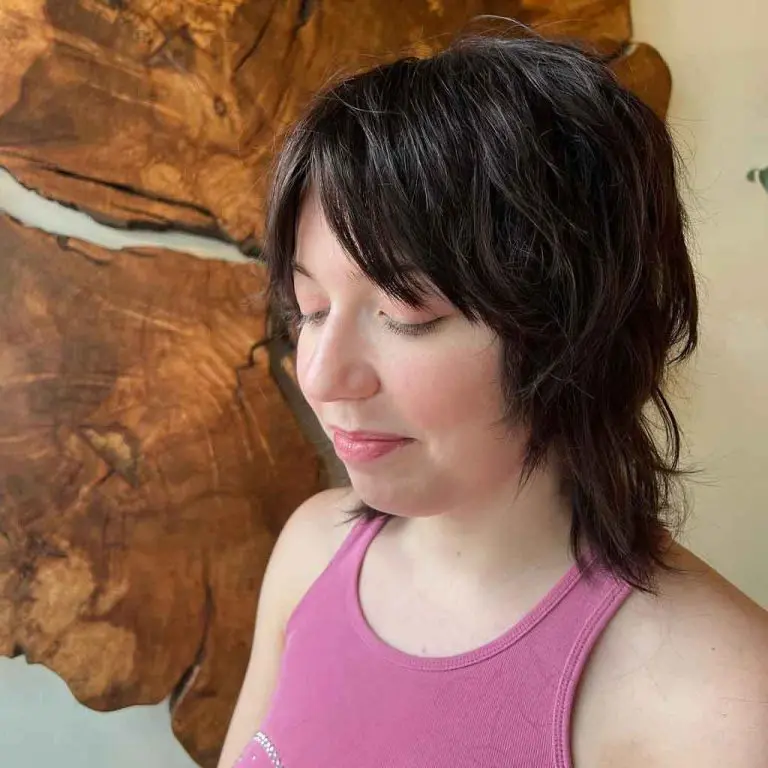 10 Short Wolf Cuts With Curtain Bangs 6 Black Choppy Mullet
