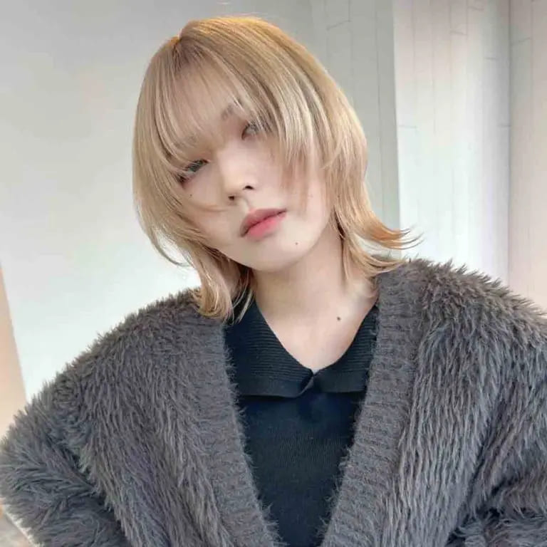 10 Blonde Wolf Cut Ideas For A Fresh Look 8 Blonde Bob Wolf Cut With Long Choppy Bangs