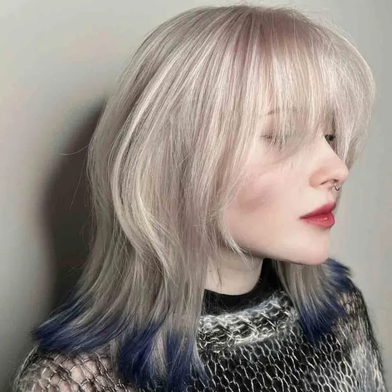 10 Blonde Wolf Cut Ideas For A Fresh Look 5 Blonde Wolf Cut With Blue Ends
