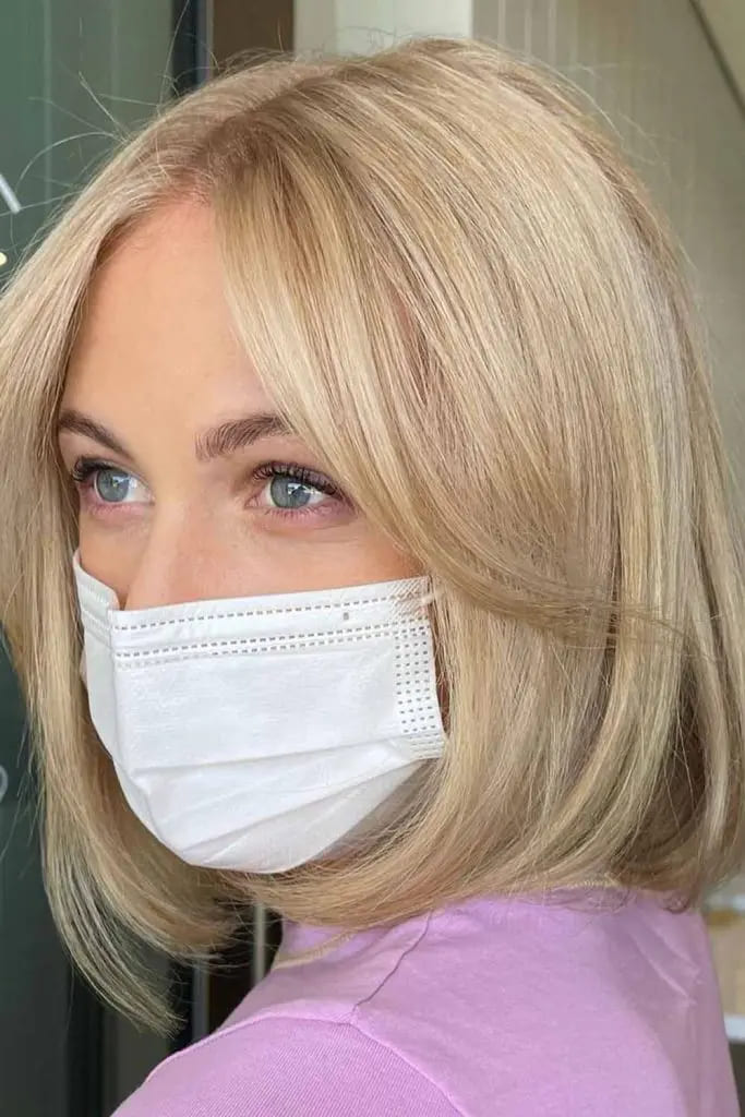 12 Classy 90’s Bob Haircut Ideas 1 Classic Blonde Bob With Curtain Bangs