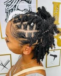 10 Locs Braids Ideas for Women 2 Half Up Half Down Locs with Braided Accents 1