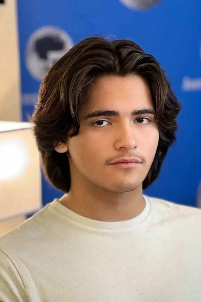 12 Flowy Haircut Ideas for Men 4 Layered Shaggy Flow