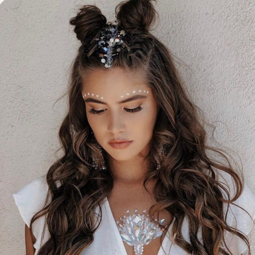 10 Sassy Hairstyles for Coachella 1 Long Wavy Hair With Half Up French Braids Into Space Buns 1024x1024 2
