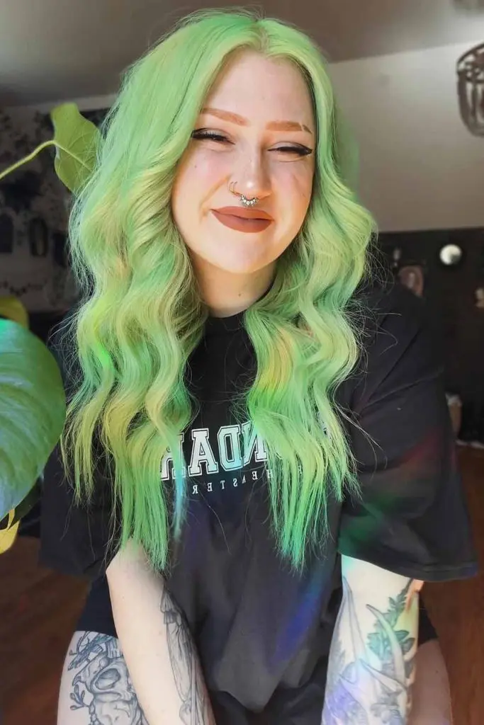 12 Bold Hair Dye Ideas for Women 8 Long Wavy Pastel Green Hair 1