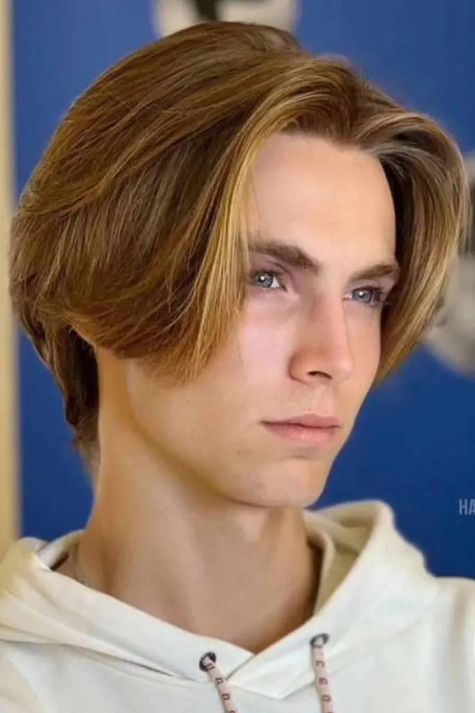 12 Flowy Haircut Ideas for Men 1 Modern Middle Part Flow