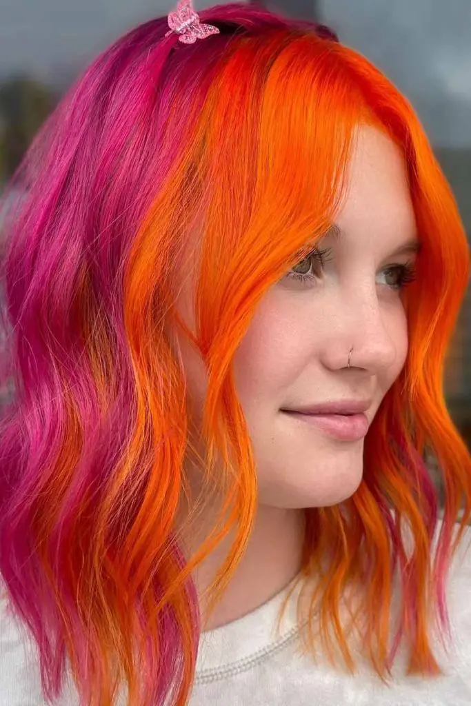 12 Bold Hair Dye Ideas for Women 6 Orange Pink Split Hair Color 1