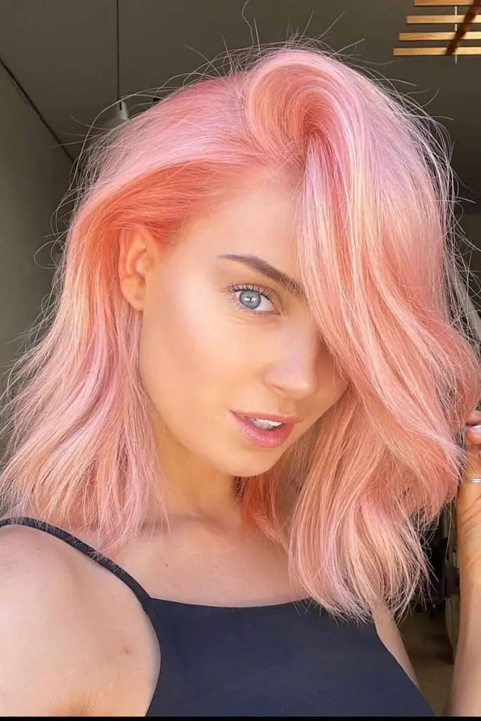10 Sexy Hairstyles for Pink Hair 7 Pastel Pink Medium Wavy Hair 1