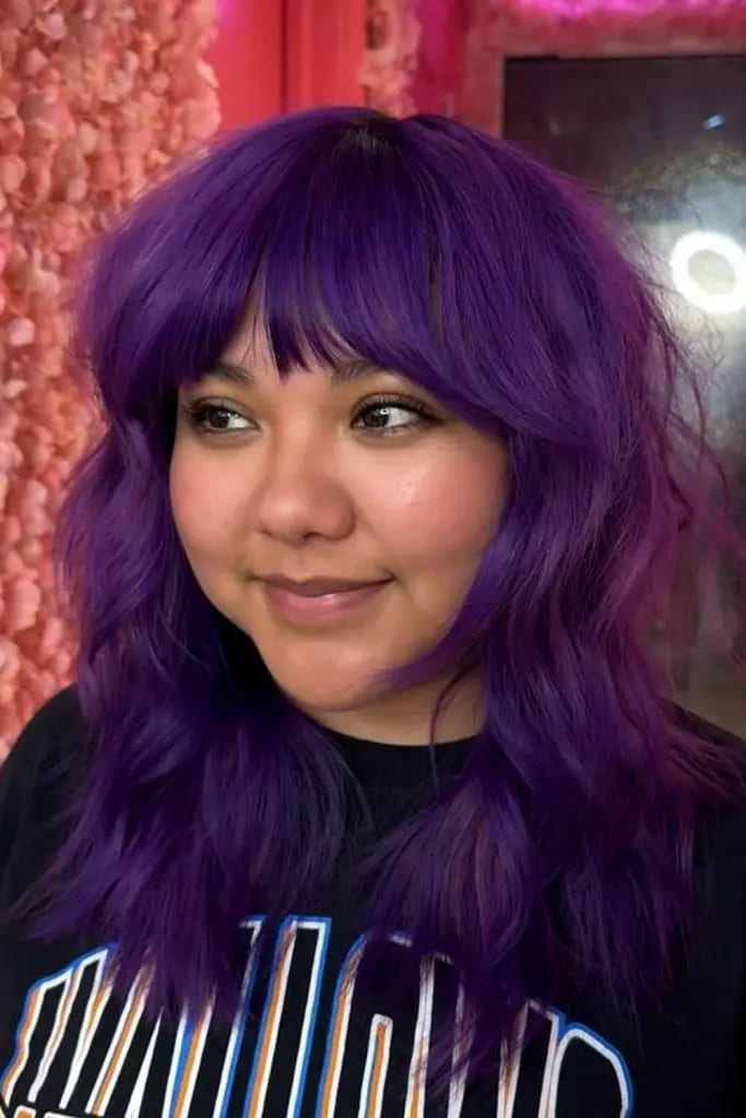 12 Vibrant Hairstyle Ideas for Purple Hair 3 Purple Shaggy Medium Wolf Cut
