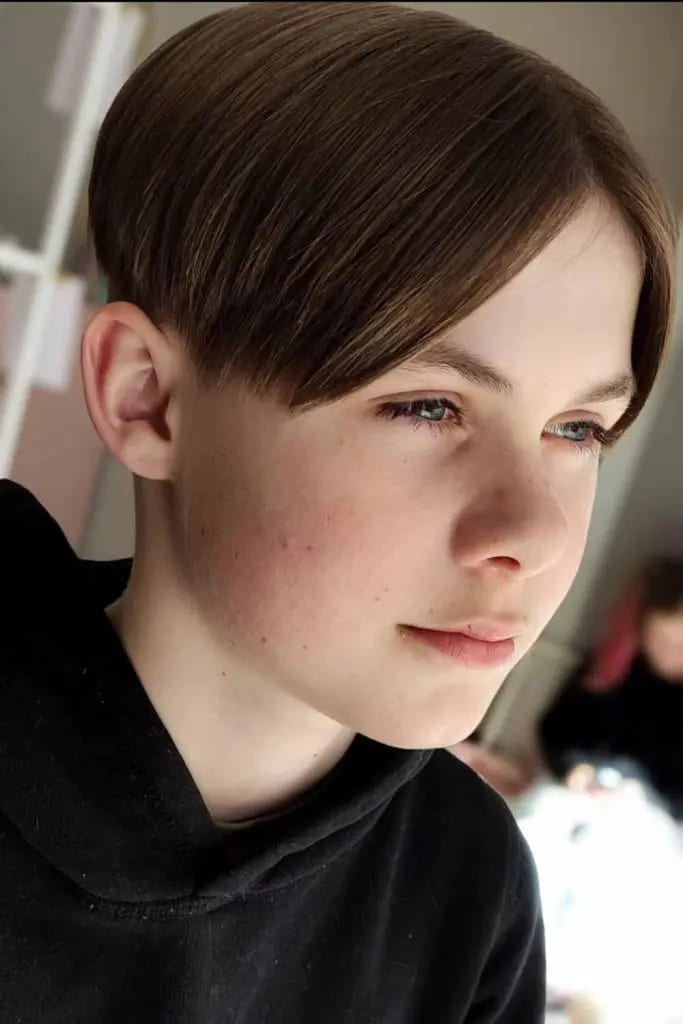 12 Charming Haircuts for Boys 3 Razor Cut With Curtain Bangs