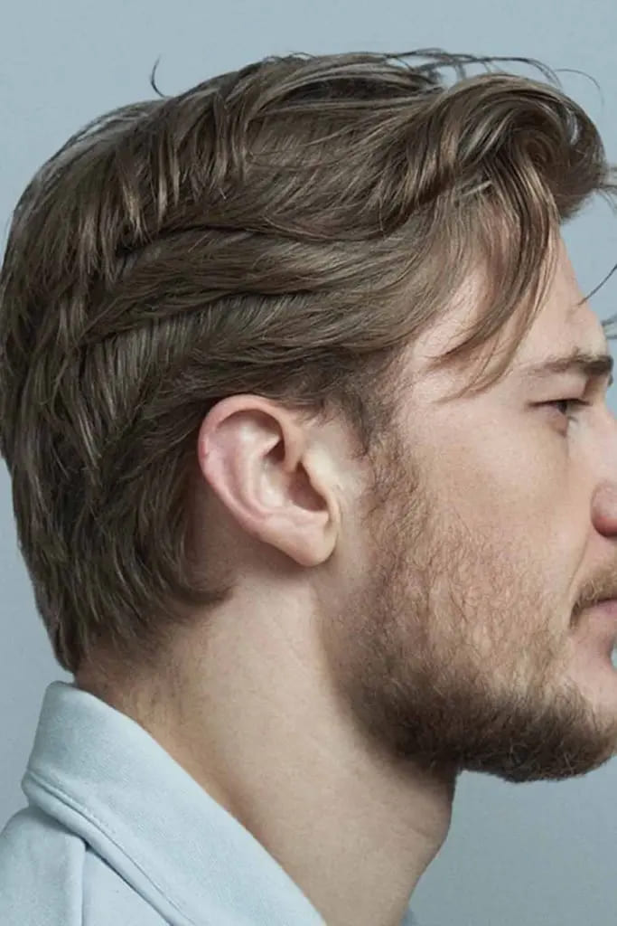 12 Flowy Haircut Ideas for Men 10 Sleek Side Part Flow