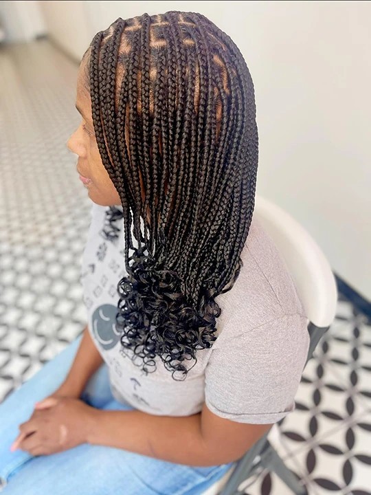 12 Knotless Braids Hairstyle Ideas: Timeless Looks for Every Vibe 2 Small Knotless Braids with Curls 1