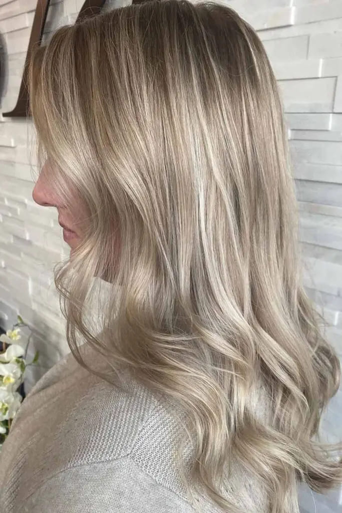 12 Lowlights for Blonde Hair 1 Soft Blonde Waves With Subtle Low Lights