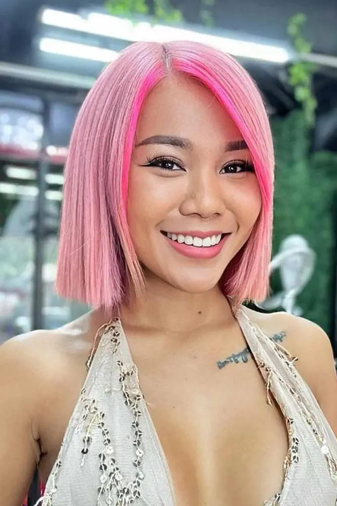10 Sexy Hairstyles for Pink Hair 3 Straight Pink Bob With Neon Pink Money Piece Highlight