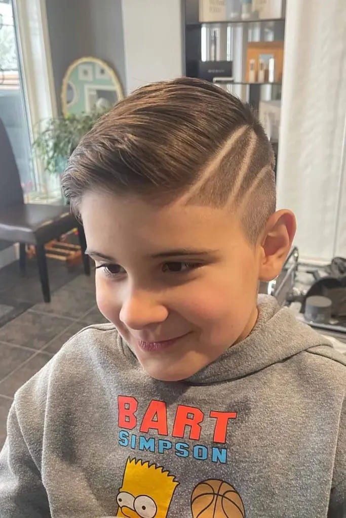 12 Charming Haircuts for Boys 5 Swept Undercut With Clean Lines