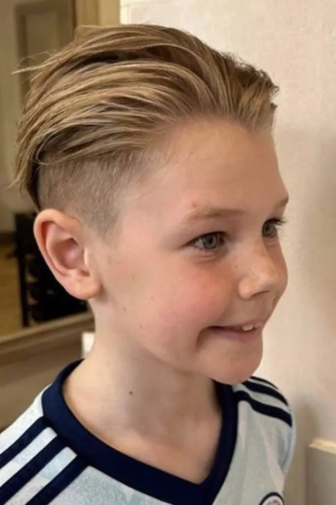 12 Charming Haircuts for Boys 4 Tapered Quiff With Blonde Highlights