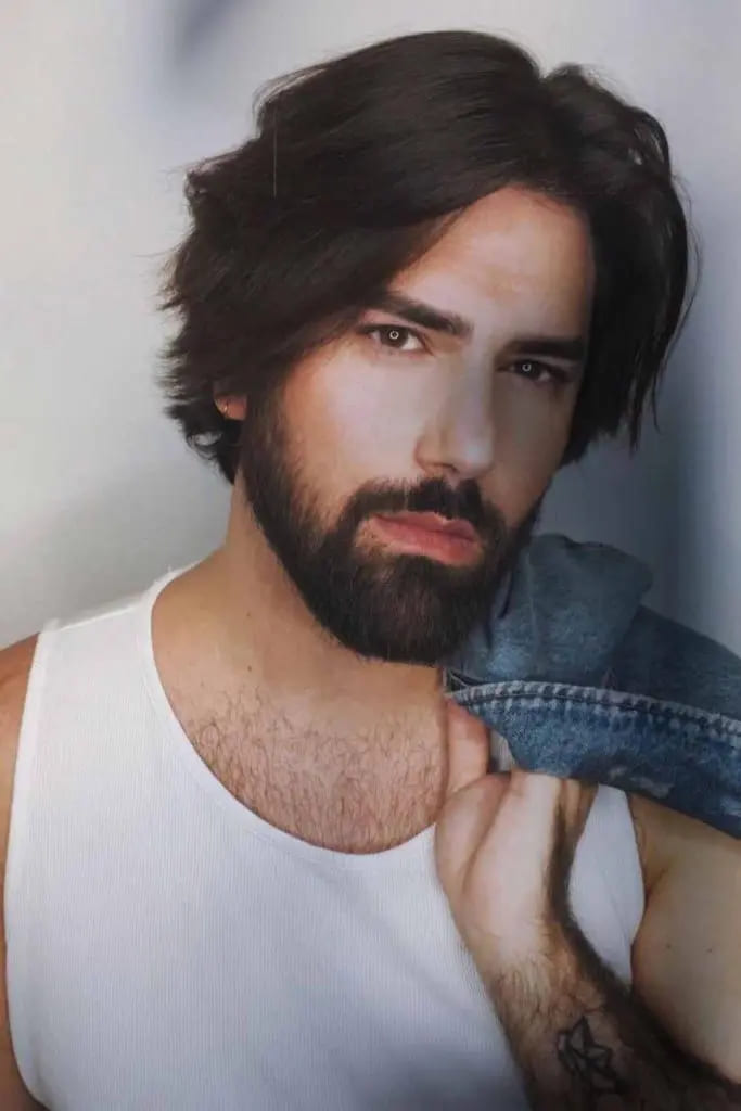 12 Flowy Haircut Ideas for Men 8 Thick Wavy Flow