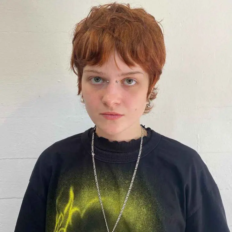 10 Short Wolf Cuts With Curtain Bangs 3 Tousled Brunette