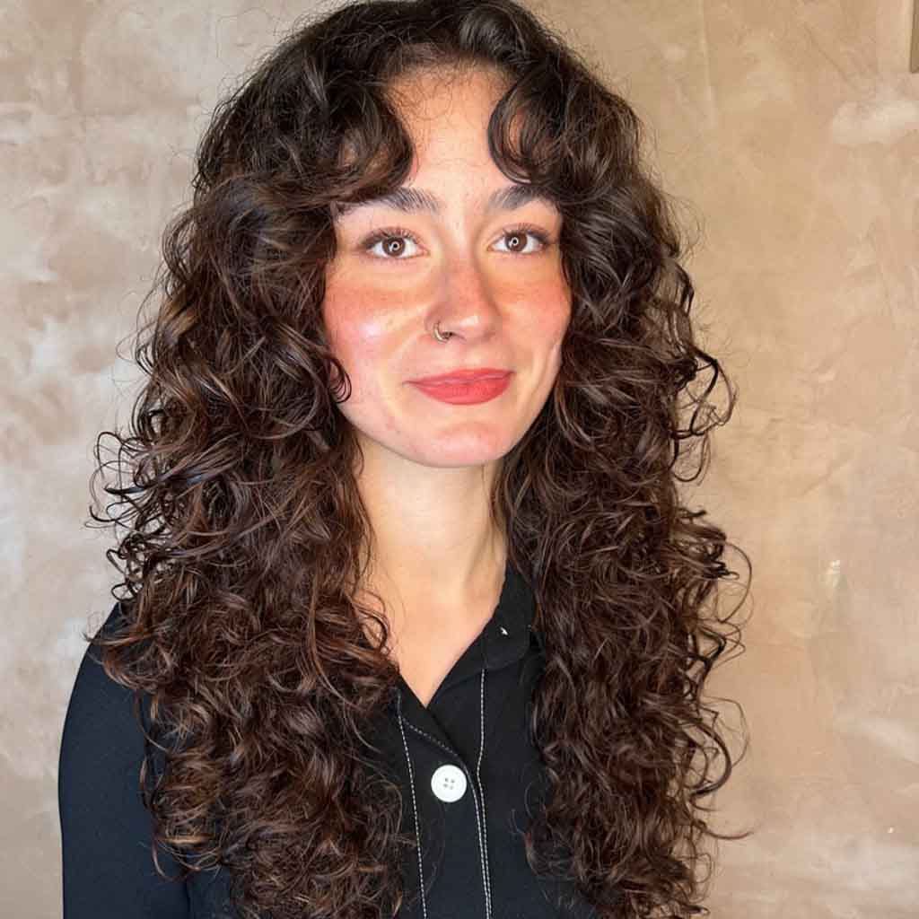15 Fun Long Layered Hairstyles for Curly Hair! 8 Razor Cut Curly Hair With Face Framing Layers