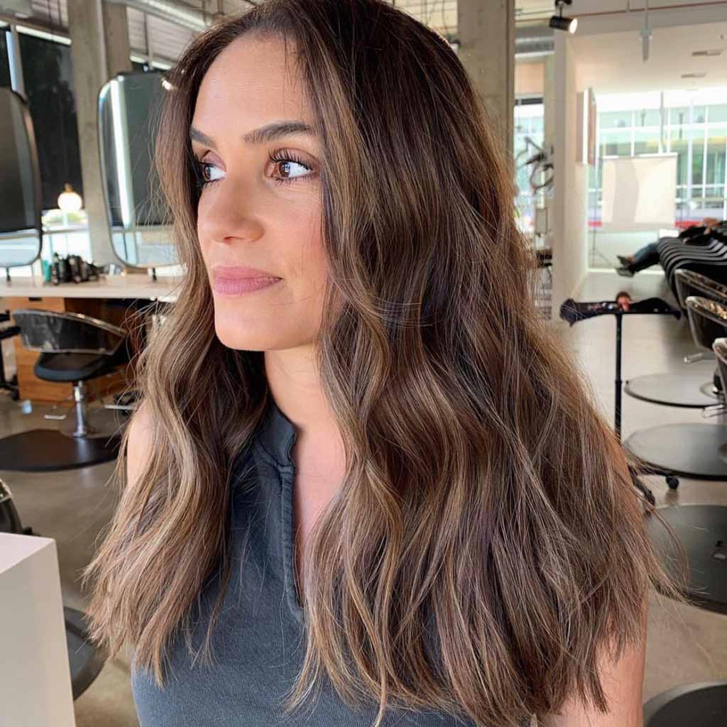 20 Bright Sun-Kissed Brunette Hair Ideas! 8 Wavy Long Sun-Kissed Caramel Brunette Balayage