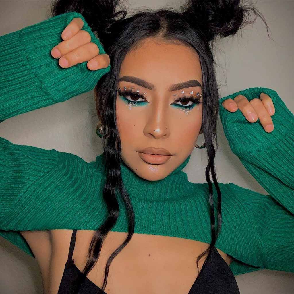 20 Sassy Hairstyles for Coachella! 12 Space Bun With Tendrils on Black Hair