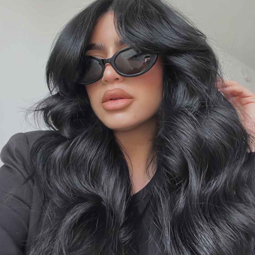 15 Retro 90s Blowout Hairstyles! 3 90s Blowout on Black Hair With Bottleneck Bangs