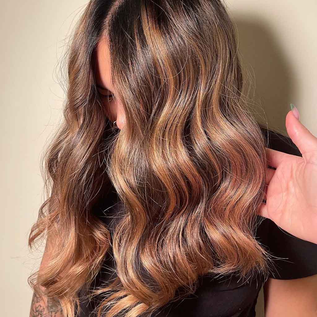 Brown Highlights With a Hint of Pink on Dark Hair